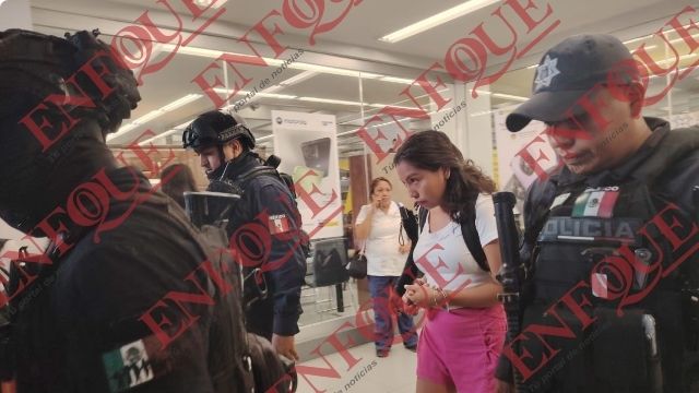 Detención de mujer por robo en sucursal de Coppel en Poza Rica